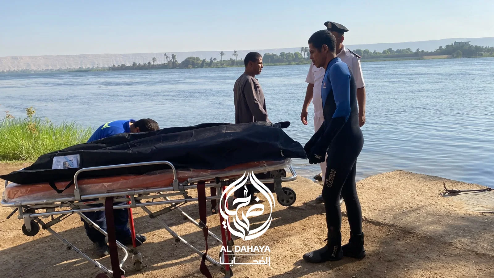 صورة 10 - بالصور و الفيديو :: انتشال جثمان مجهول الهوية من مياه النيل أمام السلخانة بمركز المراغة.. 